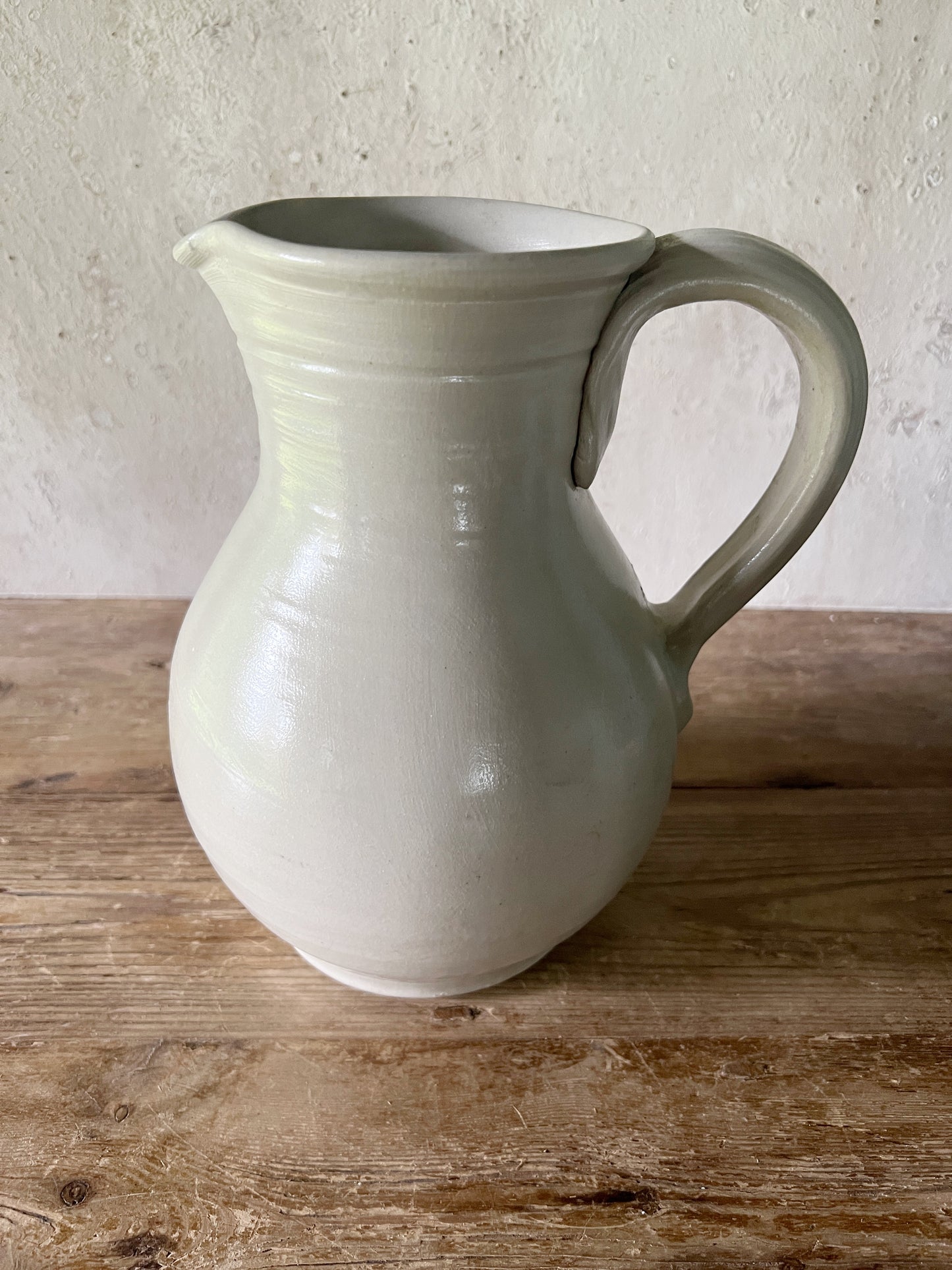 Off White Pottery Pitcher